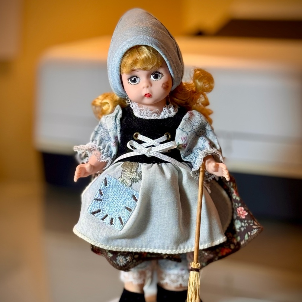 Madame Alexander Poor Cinderella doll with broom.